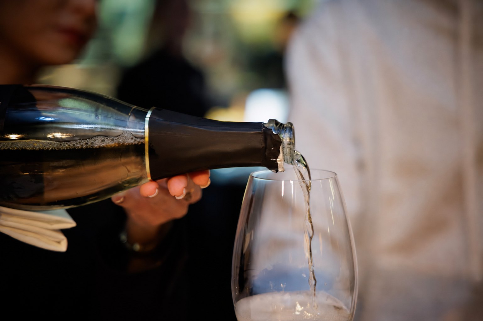 Champagne poured at the table